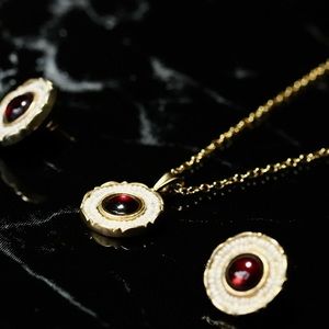 Gold vermeil pendant necklace and earrings set.